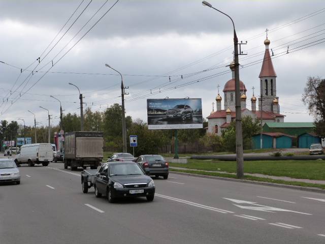 Щит 6x3,  просп. Л.Украинки (50л.Октября), перекр. с ул. Козацкой (Сов.Армии), 5 (278-й кварт.), напротив супермаркета «Маркетопт», направление в центр