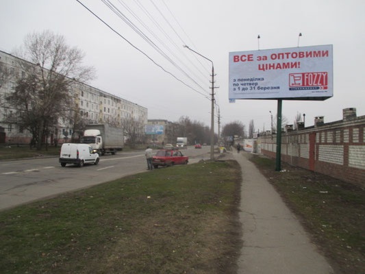Щит 6x3,  ул. Московская, перекрёсток с ул. Лебединой (ул. Кирова), район Оптового продуктового рынка, поворот к Строительному рынку